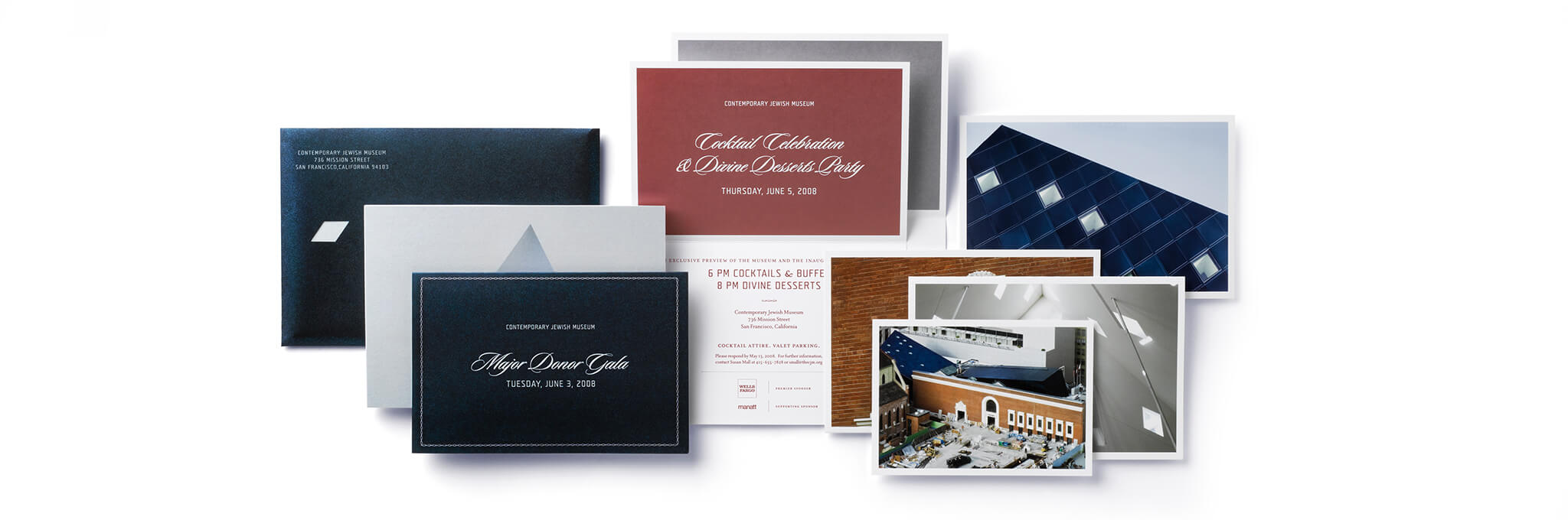 Invitation suite with cards, photos, and navy envelope