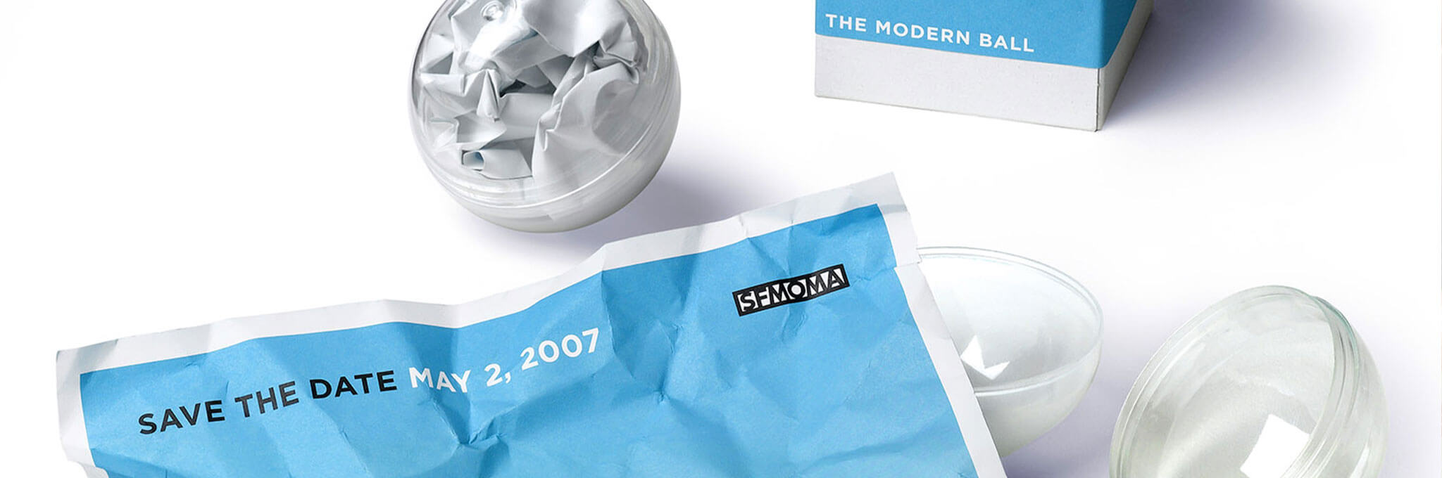 Crumpled paper ball with cropped blue May 2, 2007 Save the Date letterhead