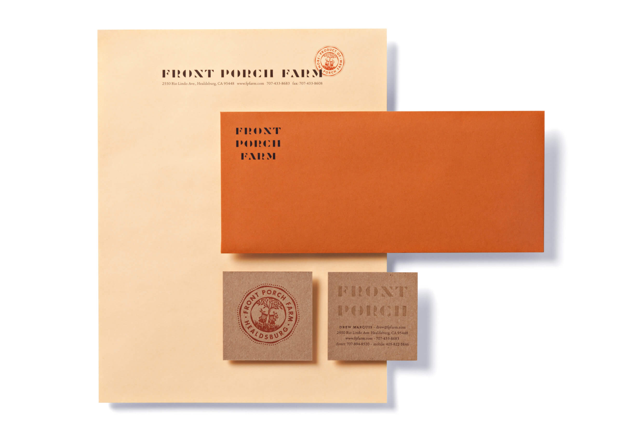 Front Porch Farm peach-colored letterhead, orange envelope, brown kraft square business cards