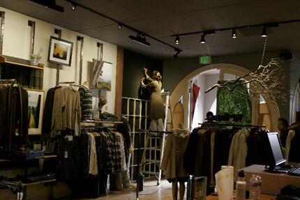 Clothing store interior with arched doorway