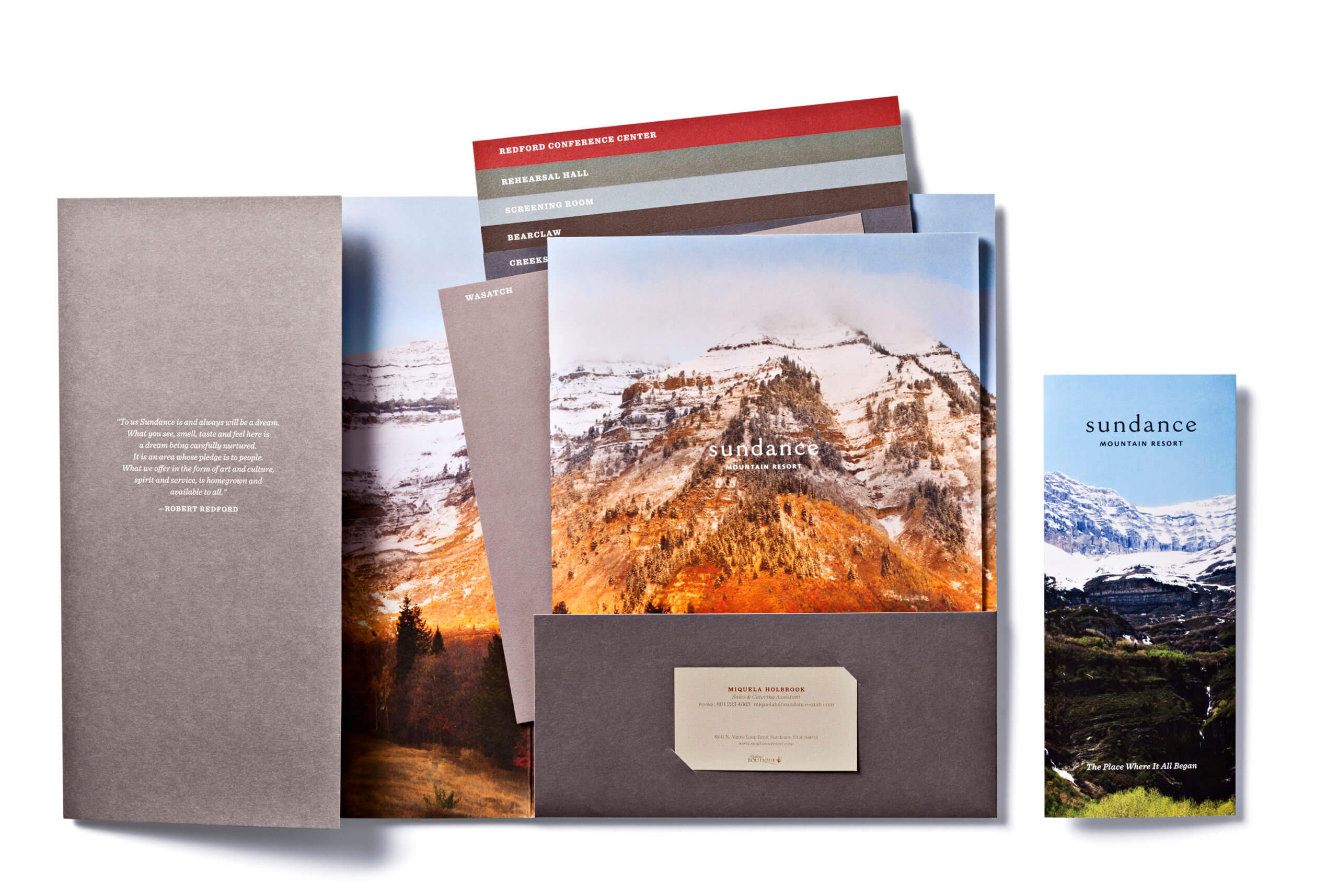 Open folder with Sundance brochures and colorful, stepped pages